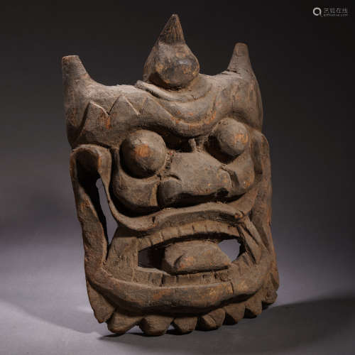 A Tibetan Carved Wooden Mask
