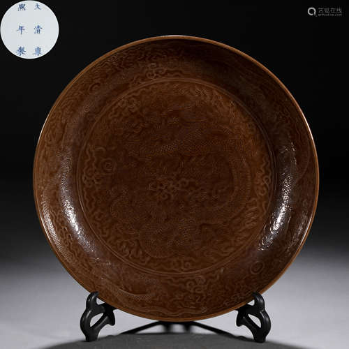 A Chinese Aubergine Glaze Dragon Saucer