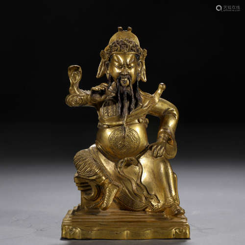 A Chinese Bronze and Gilt Figure of Guardian