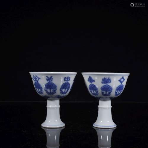 QING, PAIR OF BLUE AND WHITE BOW STRING STEM CUPS