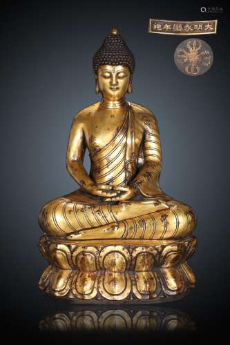 QING, GILT BRONZE CAST SEATED SAKYAMUNI BUDDHA