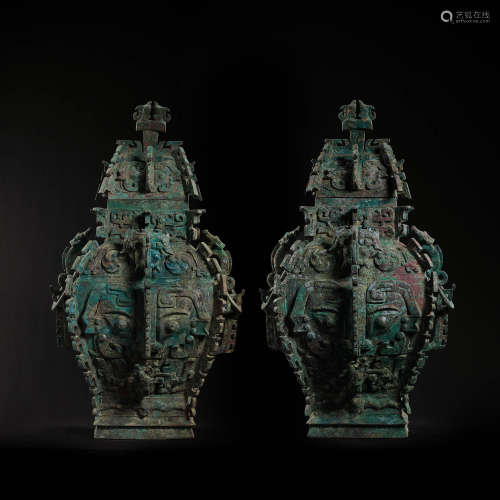 A PAIR OF BRONZE WARE FROM THE WESTERN ZHOU DYNASTY IN CHINA...
