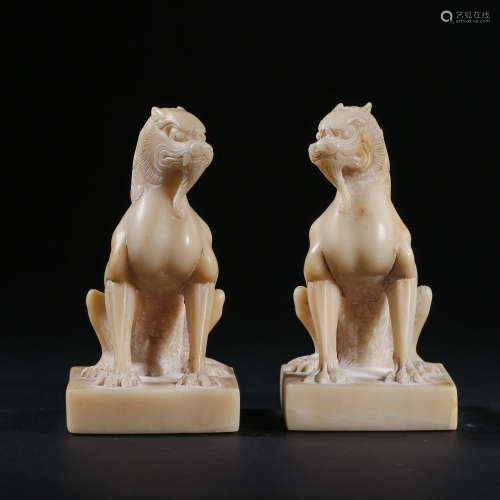 A PAIR OF CHINESE TANG DYNASTY WHITE MARBLE LIONS