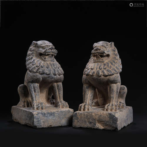 A PAIR OF CHINESE TANG DYNASTY BLUESTONE LIONS