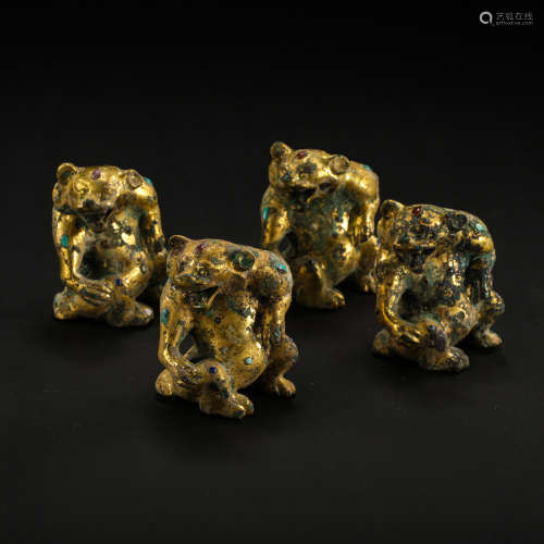 A GROUP OF CHINESE GILT BRONZE BEARS FROM THE WARRING STATES...