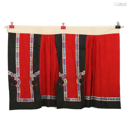A RED GROUND EMBROIDERED FLORAL LADY'S SKIRT