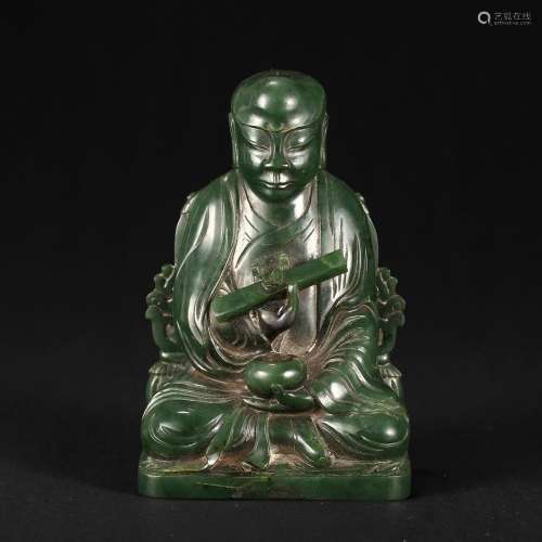 A SPINACH GREEN JADE FIGURE OF A LAMA