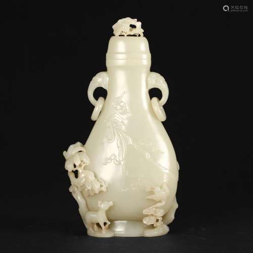 A WHITE JADE VASE WITH HANDLES