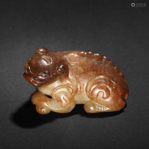 A BROWN JADE MYTHICAL BEAST CARVING