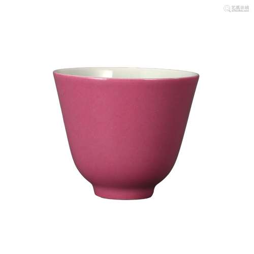 A RED-GLAZED CUP