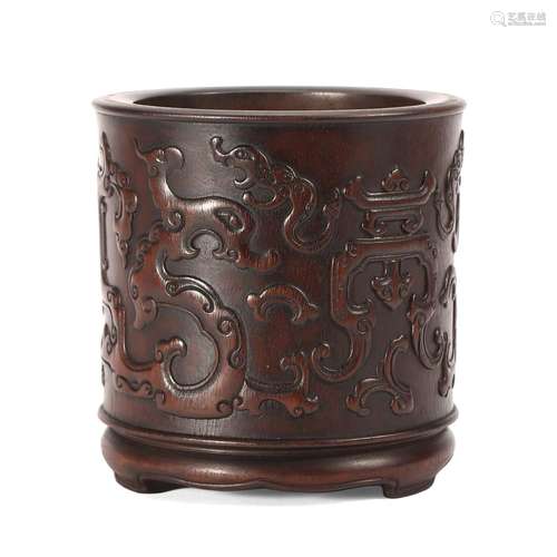 A CARVED WOOD BRUSHPOT