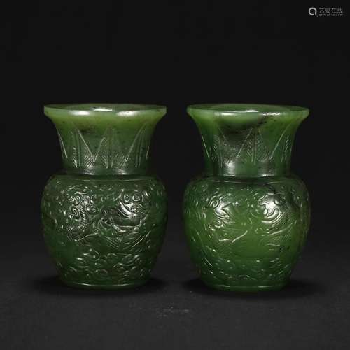 A PAIR OF SPINACH GREEN JADE BEAKER VASES