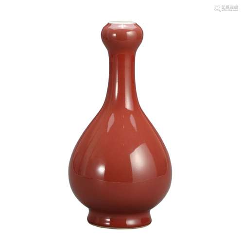 A RED-GLAZED VASE