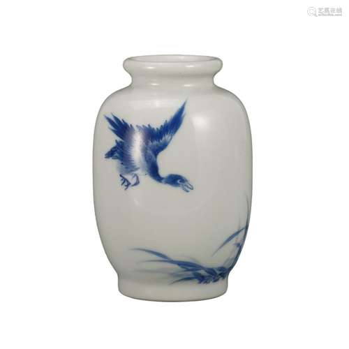 A BLUE AND WHITE 'BIRD' JAR