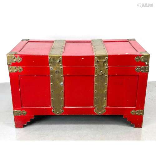 ASIAN STYLE RED PAINTED TRUNK CHEST WITH BRASS ACCENTS.