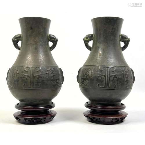 PR HANDLED ASIAN METAL VASES. INCISED WIDE BAND DESIGN. WOOD...