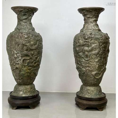 PR 7 FOOT TALL METAL URNS VASES. OVERALL RELIEF DESIGN OF DR...