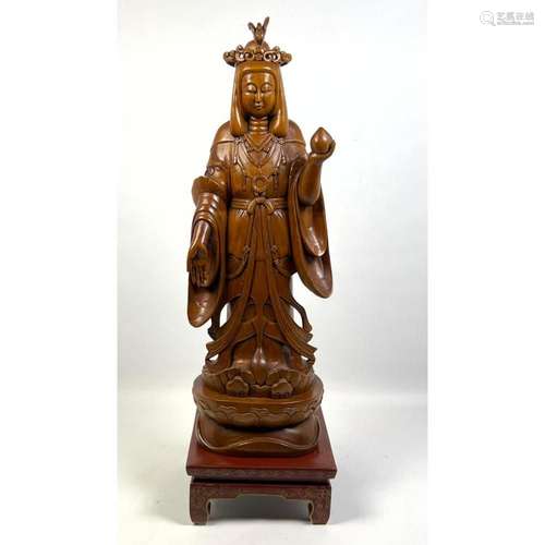 CARVED WOOD ASIAN DEITY SCULPTURE.