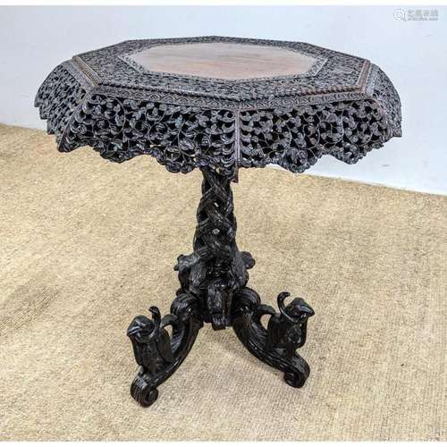 HIGHLY CARVED TOP ASIAN SIDE TABLE. CARVED TWISTED BRAIDED P...