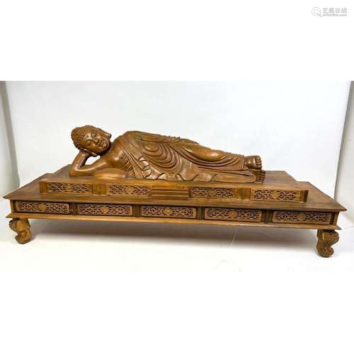 ASIAN CARVED WOOD RECLINING BUDDHA SCULPTURE. FIGURE RECLINE...