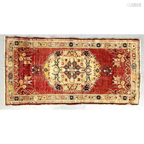 5 9" X 2 8" RUST ORIENTAL CARPET