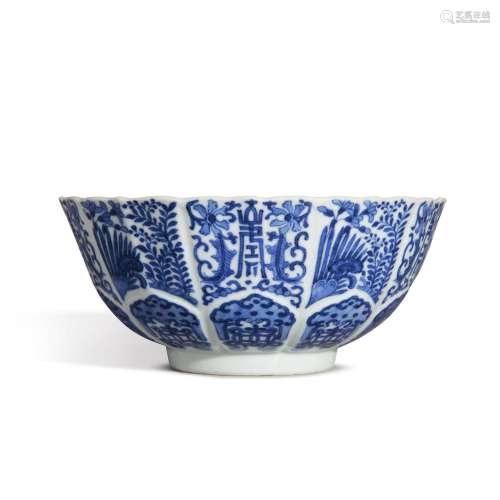 A molded blue and white barbed-rim bowl, Seal mark and perio...