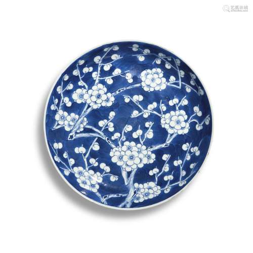 A blue and white 'prunus and cracked ice' dish, Qing...