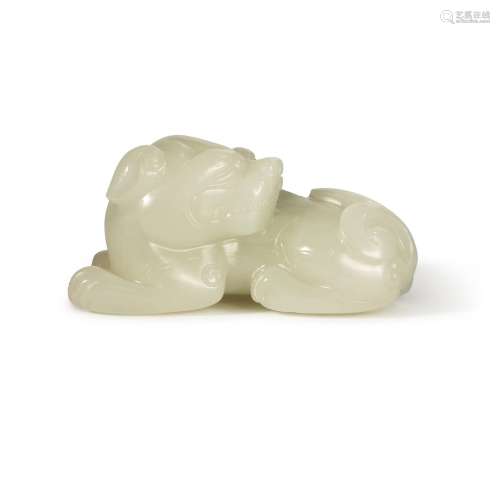 A small white jade carving of a mythical beast, Qing dynasty...