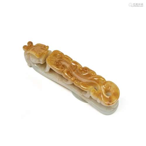 A white and russet jadeite 'chilong' belt hook, Qing...