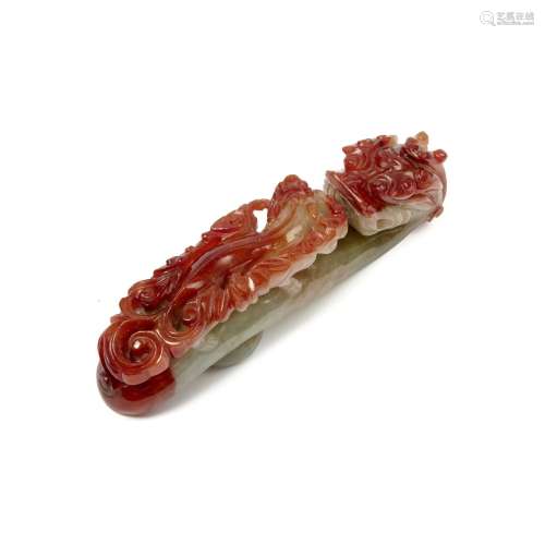 A red jadeite 'chilong' belt hook, Qing dynasty 19th...