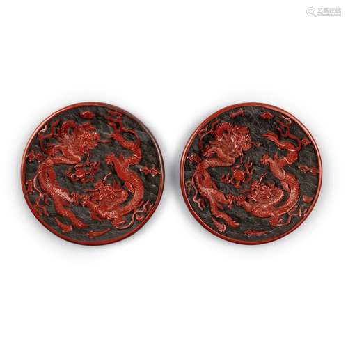 A pair of carved cinnabar lacquer 'dragon' dishes, 2...