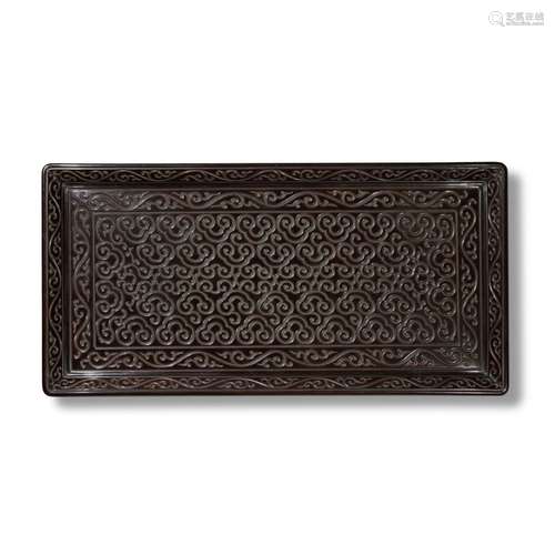 A carved black 'tixi' lacquer rectangular tray, Late...