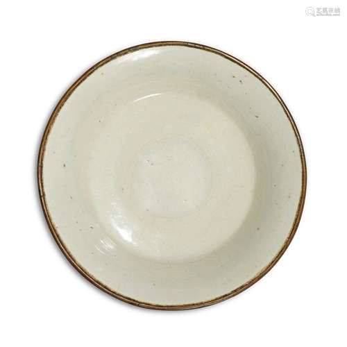 A Ding-type white-glazed dish, Song dynasty or later | 宋或以...