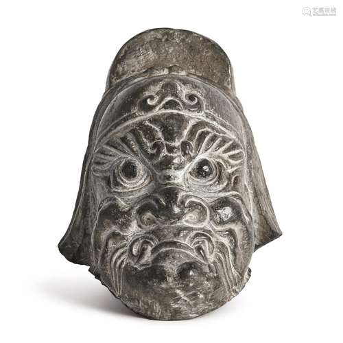 A carved stone head of a guardian, Tang dynasty | 唐 石雕天王...