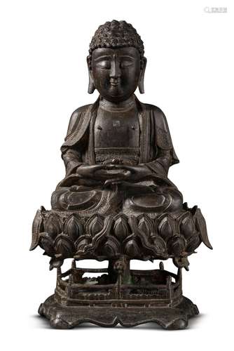 A bronze seated figure of Buddha, Late Ming dynasty | 明末 銅...