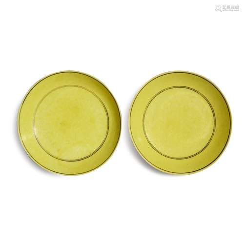 A pair of incised yellow-glazed 'dragon' dishes, Mar...