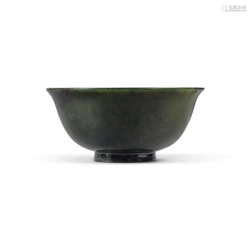 A spinach-green jade bowl, Qing dynasty, 18th / 19th century...
