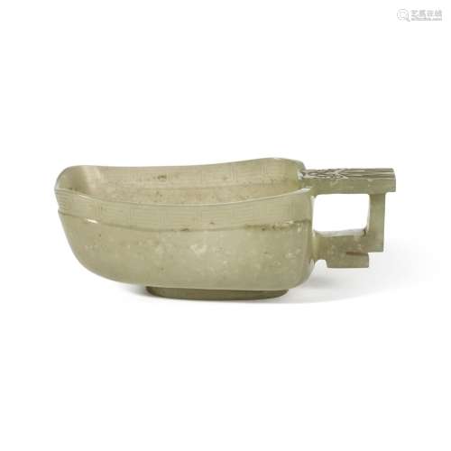 An archaistic celadon jade handled cup (Yi), 19th / 20th cen...