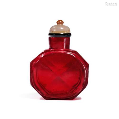A ruby-red glass faceted snuff bottle, Mark and period of Qi...