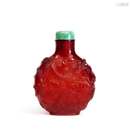 A ruby-red glass 'dragon' snuff bottle, Qing dynasty...