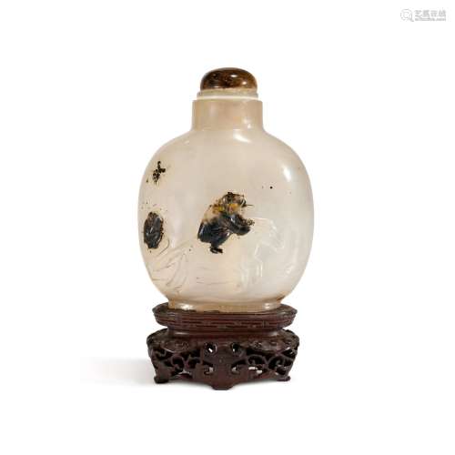 A carved agate 'monkey and horse' snuff bottle, Qing...