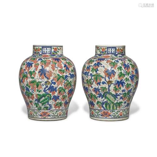 A pair of large wucai 'squirrel and grape' baluster ...