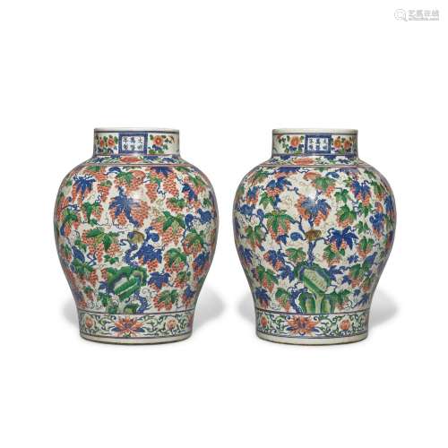 A pair of large wucai 'squirrel and grape' baluster ...