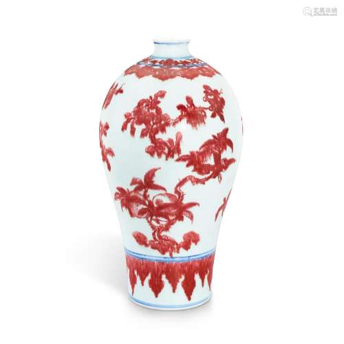 A fine copper-red and underglaze-blue 'sanduo' vase, meiping...