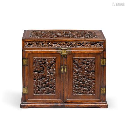 A finely carved and reticulated huanghuali 'chilong' seal ch...