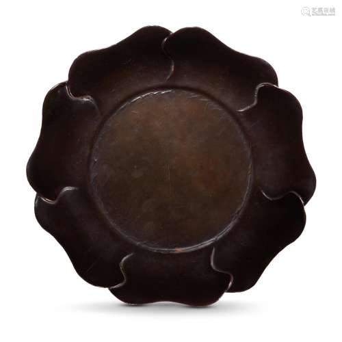A black lacquer mallow-shaped dish, Song dynasty | 宋 黑漆葵...
