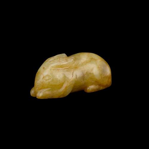 A small yellow jade figure of a rabbit, Song dynasty or earl...