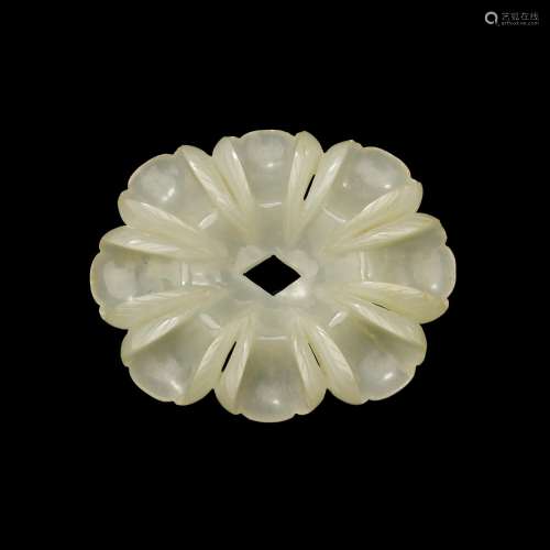 A white jade 'flower' ornament, Yuan - Ming dynasty | 元至明...