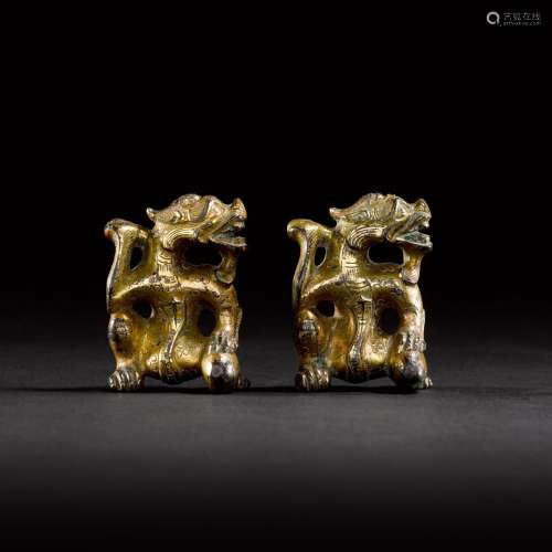 Two gilt-bronze 'dragon' supports, Eastern Han or later | 東...
