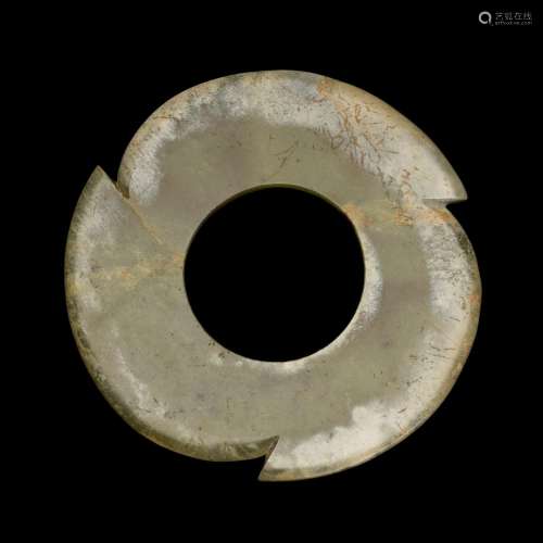 A celadon jade notched disc, Late Neolithic period - Shang d...